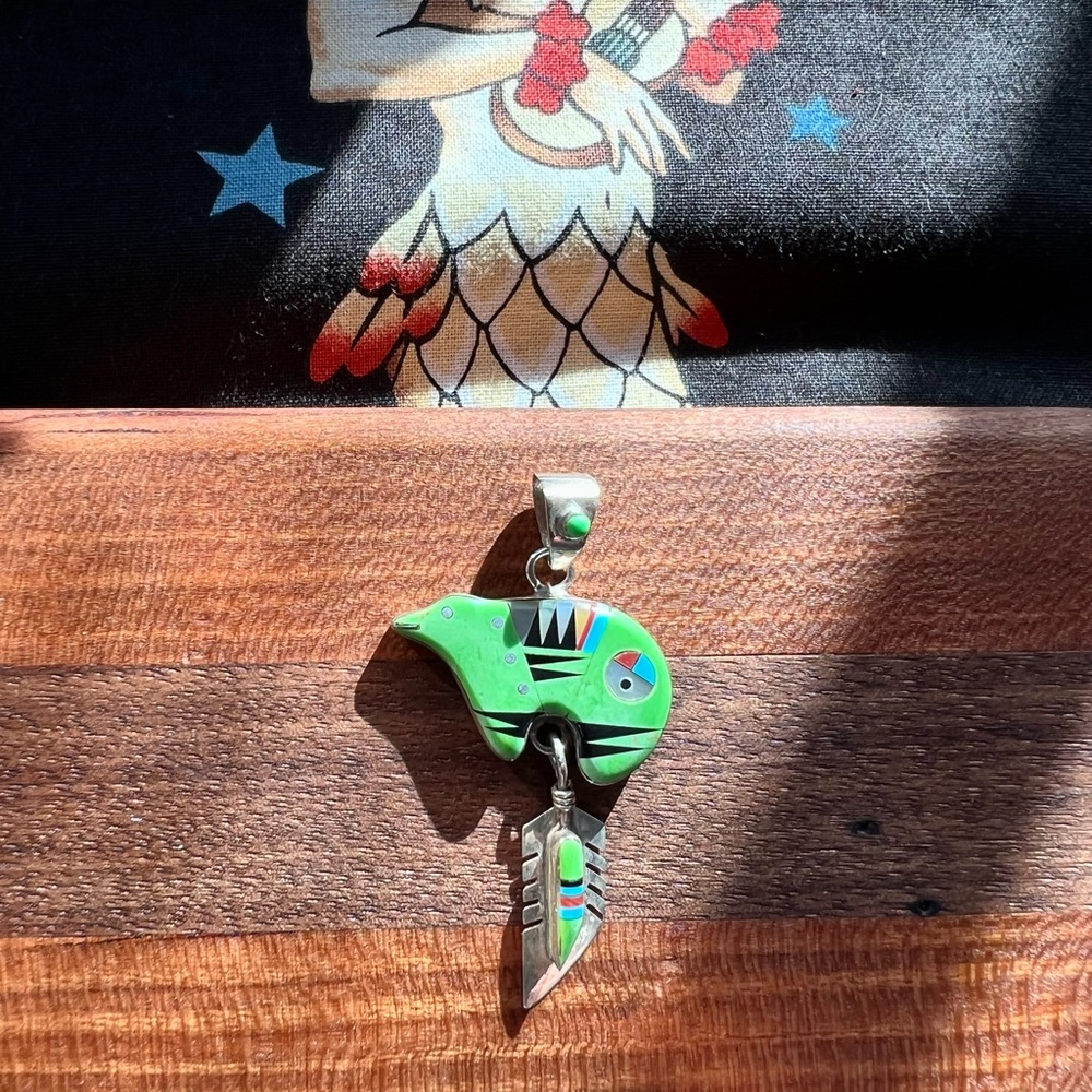 Turquoise inlaid bear and feather pendant.  Sterling silver